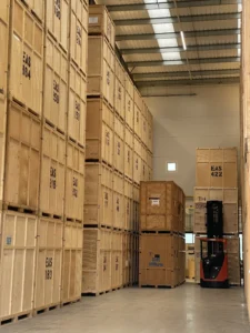 Containerised storage warehouse with stacked 35 to 50 sqft storage crates managed by Elite Moving for secure long-term storage